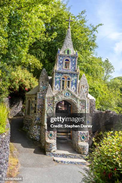 the little chapel decorated with shells and broken pottery in les vauxbelets valley, guernsey, channel islands uk - little chapel stock pictures, royalty-free photos & images