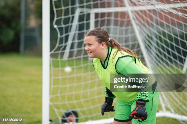 preparation to save goal - girl goalie stock pictures, royalty-free photos & images