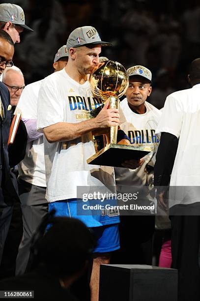 Jason Kidd of the Dallas Mavericks kisses the Larry O'Brien Trophy in celebration after defeating the Miami Heat in Game Six of the 2011 NBA Finals...