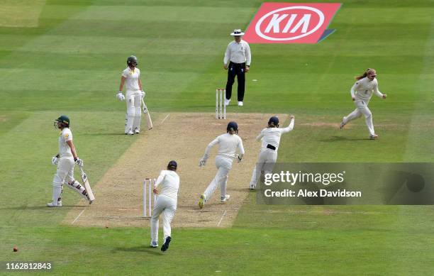 Sophie Ecclestone of England celebrates the wicket of Meg Lanning of Australia during Day One of the Kia Women's Test Match between England Women and...