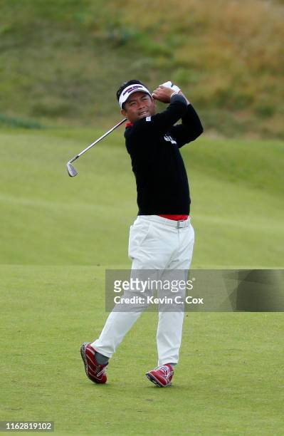 Yuta Ikeda of Japan plays a shot on the 8th hole during the first round of the 148th Open Championship held on the Dunluce Links at Royal Portrush...