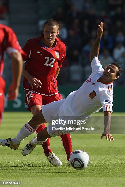 Thiago Alcantara of Spain is fouled by Adam Hlousek during the UEFA European Under-21 Championship Group B match between Czech Republic and Spain at...