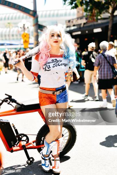 Cosplayer dressed as Harley Quinn attends the 2019 Comic-Con International on July 18, 2019 in San Diego, California.