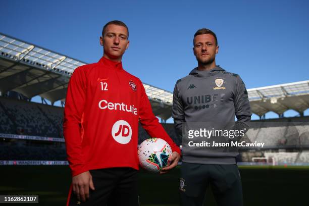 Mitchell Duke of the Wanderers and Liam Cooper of Leeds United pose during a Leeds United media opportunity at Bankwest Stadium on July 19, 2019 in...