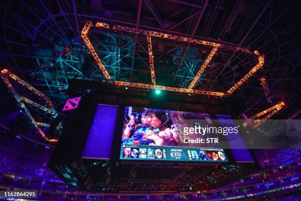 Screen shows a live image of the Dota 2 eSports match between team Alliance and team RNG during the International Dota 2 Championships in Shanghai on...