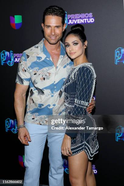 Sebastian Rulli and Renata Notini attend Premios Juventud 2019 at Watsco Center on July 18, 2019 in Coral Gables, Florida.