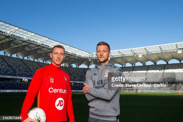 Mitchell Duke of the Wanderers and Liam Cooper of Leeds United pose during a Western Sydney Wanderers and Leeds United press conference at Bankwest...