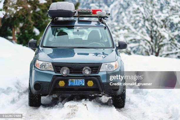 subaru forester in the snow - subaru stock pictures, royalty-free photos & images