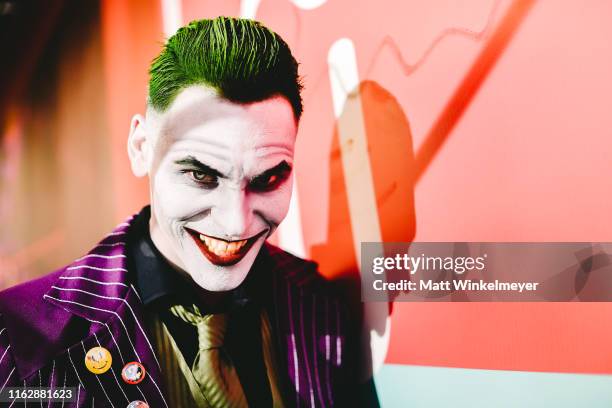 Cosplayer dressed as The Joker attends the 2019 Comic-Con International on July 18, 2019 in San Diego, California.
