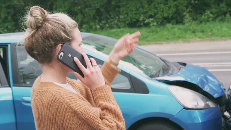 https://media.gettyimages.com/id/1162897978/video/female-motorist-involved-in-car-accident-calling-insurance-company-or-recovery-service.jpg?b=1&s=640x640&k=20&c=7XHEdkOYtx6hNCy33yKT3c3Eiz8wpVQSjQJZNIly15I=