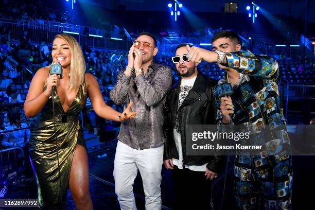 MIgbelis Castellano, Chris Jeday, Gaby Music and Lunay speak on stage during Premios Juventud 2019 at Watsco Center on July 18, 2019 in Coral Gables,...