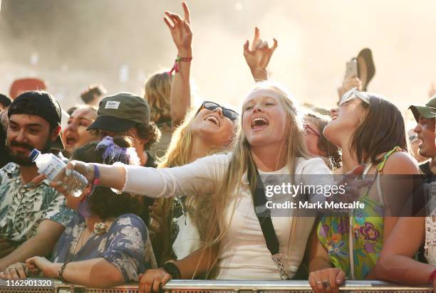 Festival goers watch Wolfmother perform on the Amphitheatre stage during Splendour In The Grass 2019 on July 19, 2019 in Byron Bay, Australia.