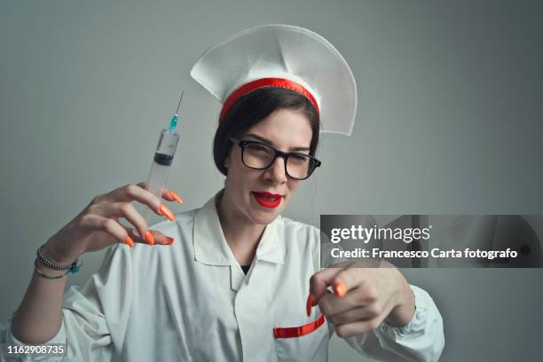 menacing nurse - doctor humor stock pictures, royalty-free photos & images