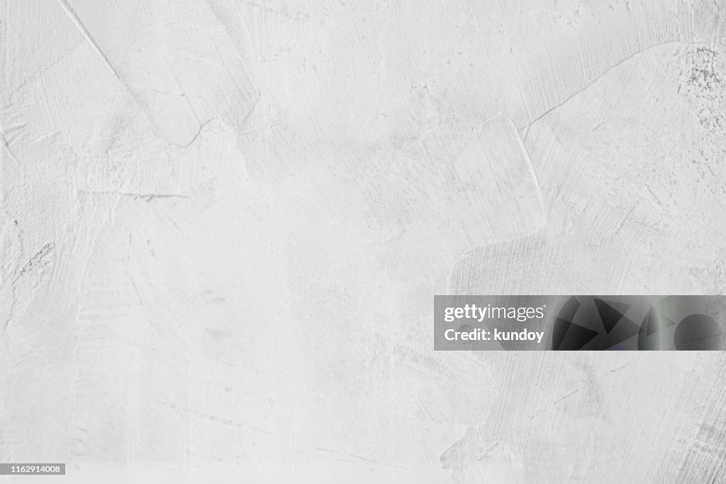 White concrete texture with grunge in daylight. Vintage and loft background.
