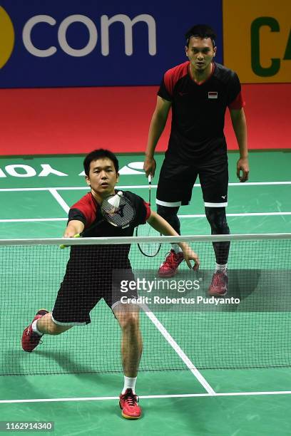 Mohammad Ahsan and Hendra Setiawan of Indonesia compete against Hiroyuki Endo and Yuta Watanabe of Japan on day four of the Bli Bli Indonesia Open at...