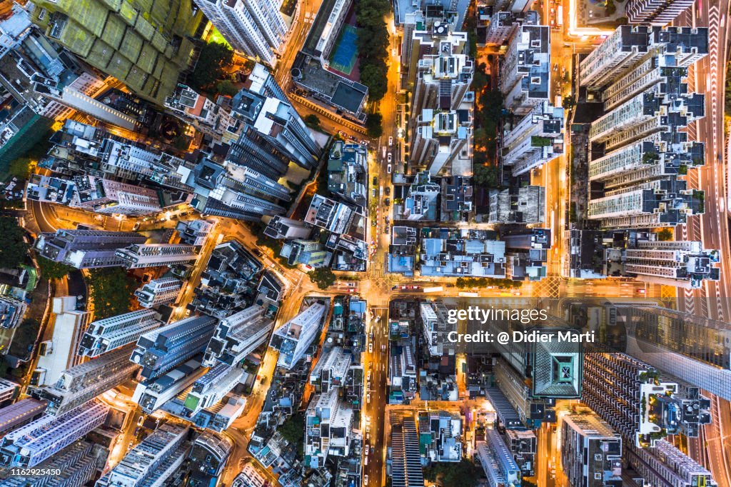 Stunning aerial view at night of the very crowded Hong Kong island streets