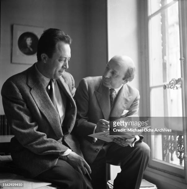 Armenian-Canadian photographer Yousuf Karsh and French philosopher, author, and journalist Albert Camus , Paris, France, 1958.