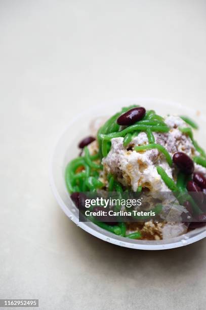 bowl of ice cendol - coconut shaving stock pictures, royalty-free photos & images