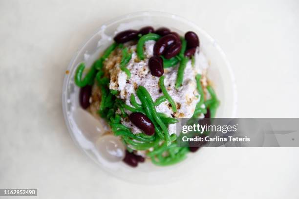 bowl of ice cendol - coconut shaving stock pictures, royalty-free photos & images
