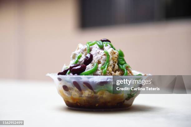 bowl of ice cendol - coconut shaving stock pictures, royalty-free photos & images