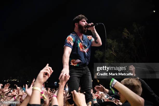 Yannis Philippakis of Foals performs in the crowd on the Amphitheatre stage during Splendour In The Grass 2019 on July 19, 2019 in Byron Bay,...