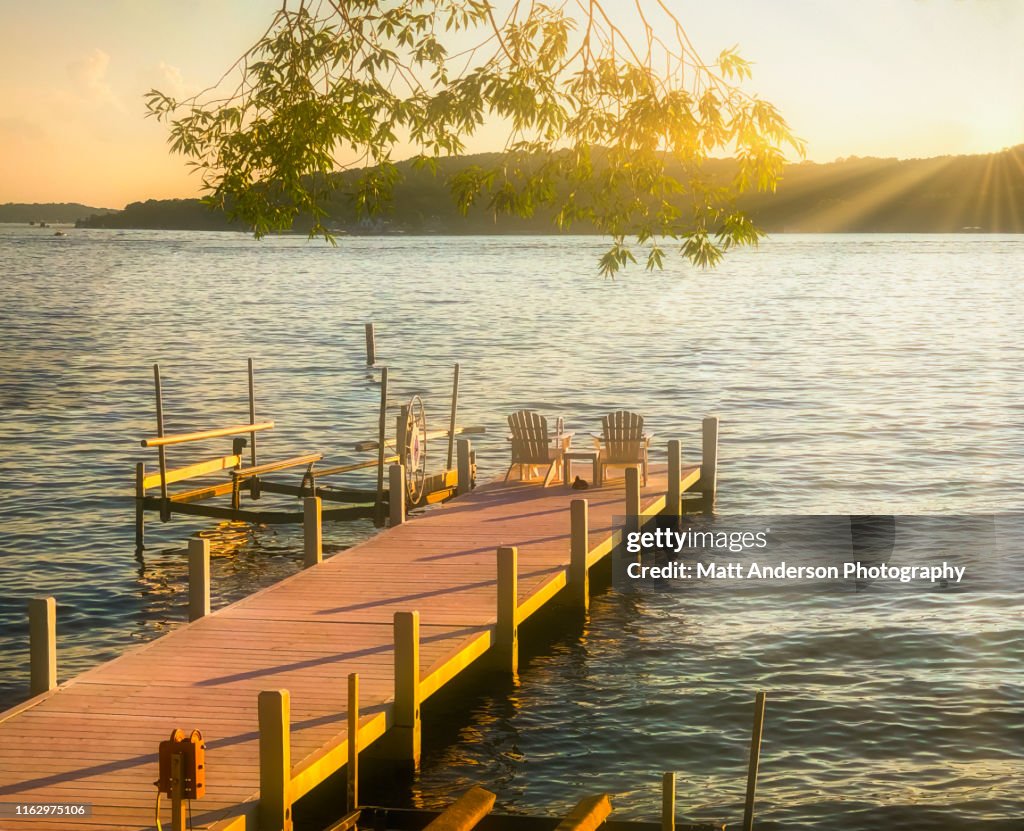 Lake Geneva Pier with Chairs at Sunset