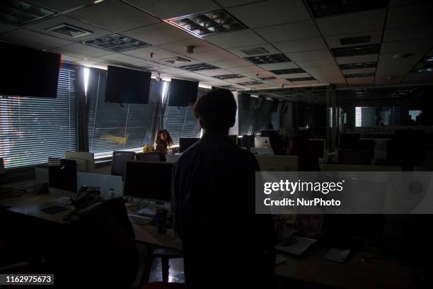 Group of people mobilize in a bus while the blackout continues on on 20 August 2019, in Caracas . At least eleven states of Venezuela continue on...