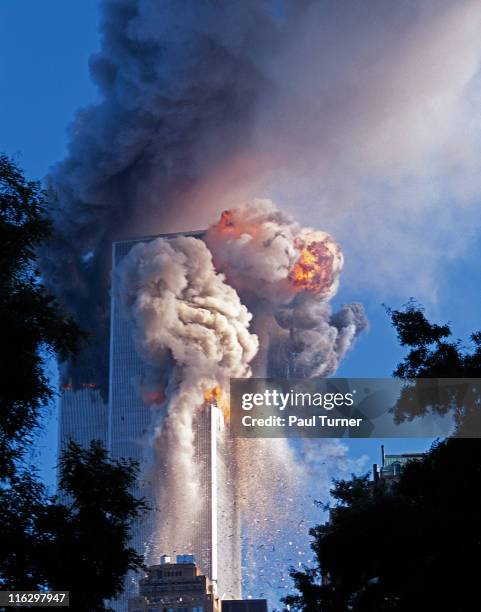 The moment of impact as United Airlines Flight 175, hijacked after taking off from Boston's Logan International Airport, hits the 77th to 85th floors...