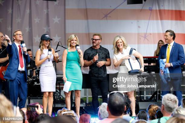 Anchors Steve Doocy, Jillian Mele, Ainsley Earhardt, Pete Hegseth and meteorologist Janice Dean join Phil Vassar as performs on "FOX & Friends"...