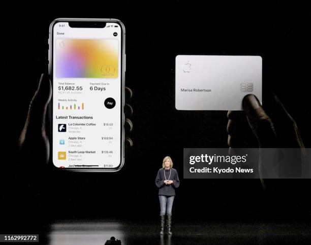 Photo taken in March 2019 shows an Apple Inc. Official explaining Apple Card, a digital credit card available to iPhone users, at an event in...