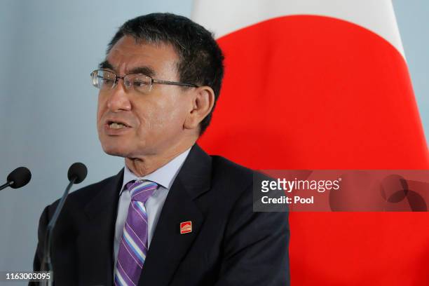 Japanese Foreign Minister Taro Kono speaks during a press conference after the ninth trilateral foreign ministers meeting among China, South Korea...