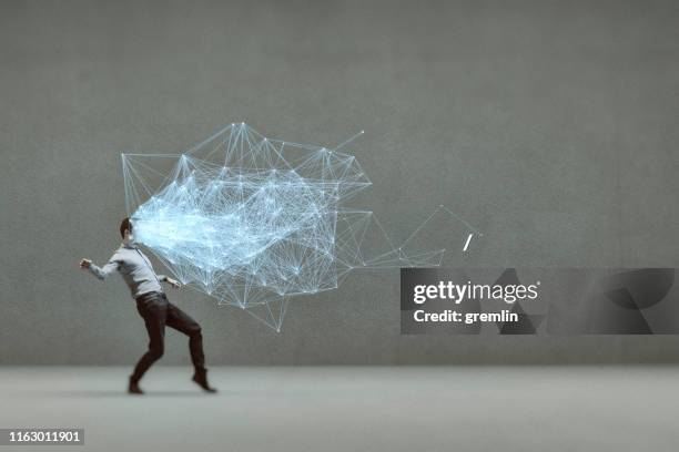 careful businessman tiptoeing towards smart phone - stealth stock pictures, royalty-free photos & images