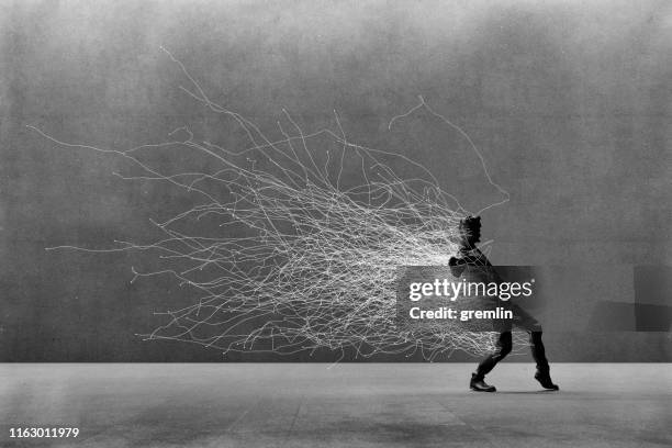 careful businessman tiptoeing away - walking on tip toe stock pictures, royalty-free photos & images