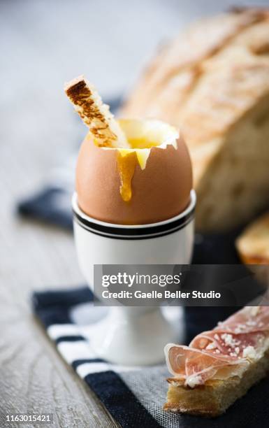 soft boiled egg with bread and prosciutto ham - soft boiled egg stock pictures, royalty-free photos & images