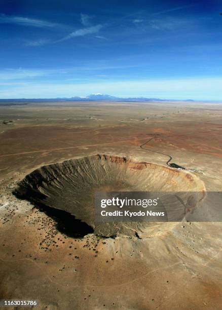 Undated file photo shows Meteor Crater in Arizona. ==Kyodo