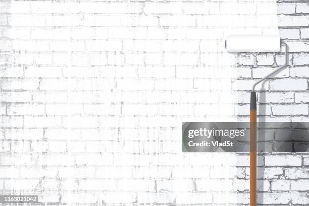 painting white grunge brick wall with paint roller - white painted brick wall stock illustrations