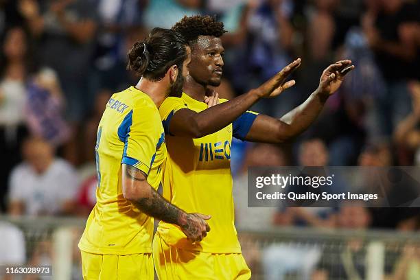 Ze Luis of FC Porto celebrates scoring his team's opening goal with team mates during a pre season friendly match at the Copa Iberica at Estadio...