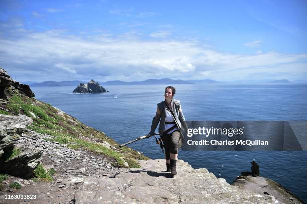 Star Wars fan and cosplayer Sharon Zonneveld, dressed as the character Rey pictured as she walks along a narrow path on Skellig Michael on August 21,...
