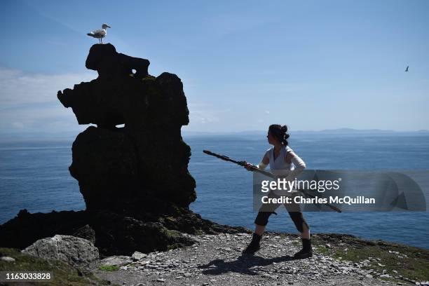Star Wars fan and cosplayer Sharon Zonneveld, dressed as the character Rey poses for a photograph at the Wailing Woman rock as she attempts to...
