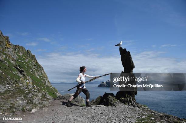 Star Wars fan and cosplayer Sharon Zonneveld, dressed as the character Rey poses for a photograph beside the Wailing Woman rock as she attempts to...