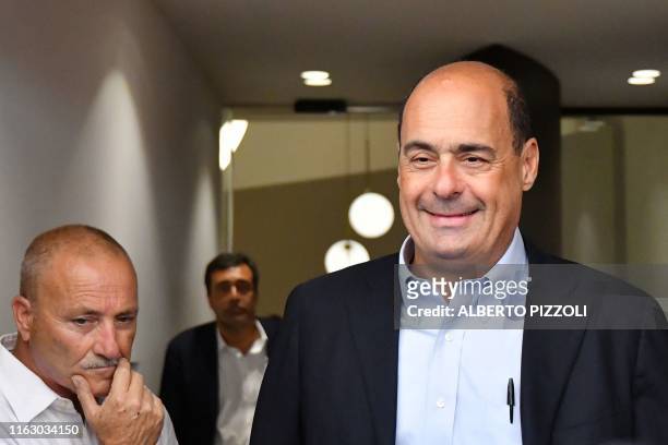 Leader of the Partito Democratico political party, Nicola Zingaretti, leaves the PD headquarters to answer journalists' questions on August 21, 2019...