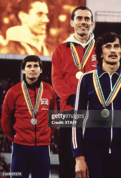 Gold medalist Steven Ovett , from Great Britain, smiles during the British National Anthem, 26 July 1980 on the Olympic 800m podium event in the...