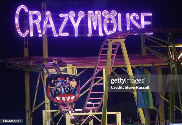 Riders enjoy the Crazy Mouse ride at The Canadian National Exhibition, know as simply "The Ex", runs over the last two weeks of the summer since 1879...