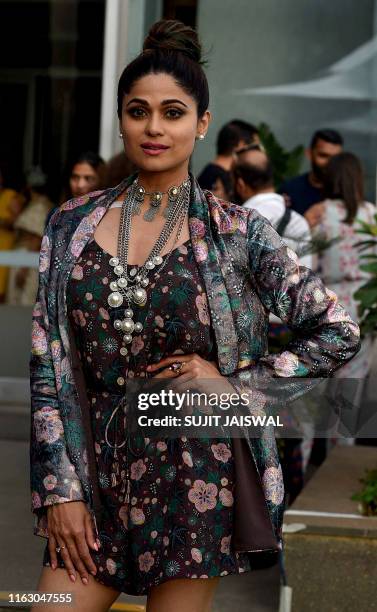 Indian Bollywood actress Shamita Shetty poses for a photograph during Lakme Fashion Week Winter Festive 2019 in Mumbai on August 21, 2019. / XGTY /...