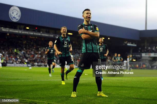 Bersant Celina of Swansea City celebrates after scoring the opening goal during the Sky Bet Championship match between Queens Park Rangers and...