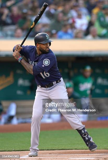 Domingo Santana of the Seattle Mariners bats against the Oakland Athletics in the top of the first inning at Ring Central Coliseum on July 16, 2019...
