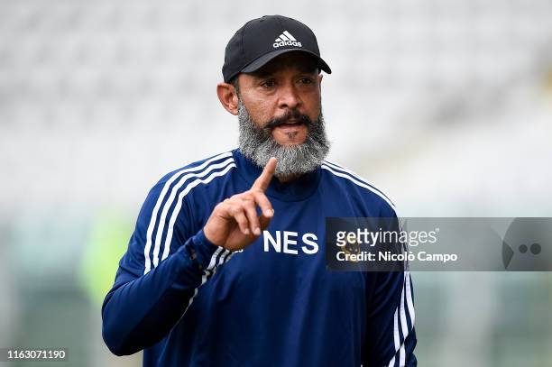 Nuno Espirito Santo gestures during Wolverhampton Wanderers FC training on the eve of the UEFA Europa League playoff round football match between...