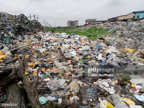 View of Idi-Araba abattoir canal, in Lagos, Nigeria, on 21 August 2019 filled with dumps of used foams, empty food containers, float and block...