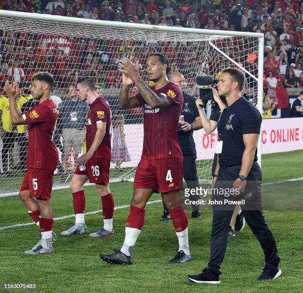 Virgil van Dijk of Liverpool shows his appreciation to the fans at the end of the pre-season friendly match between Borussia Dortmund and Liverpool...