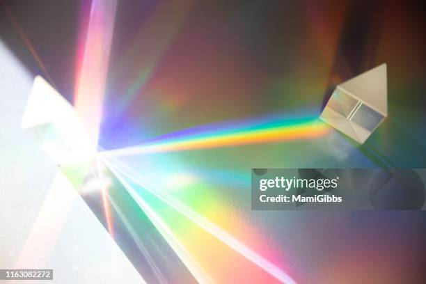 multiple prisms reflecting light - rainbow light reflection stock pictures, royalty-free photos & images